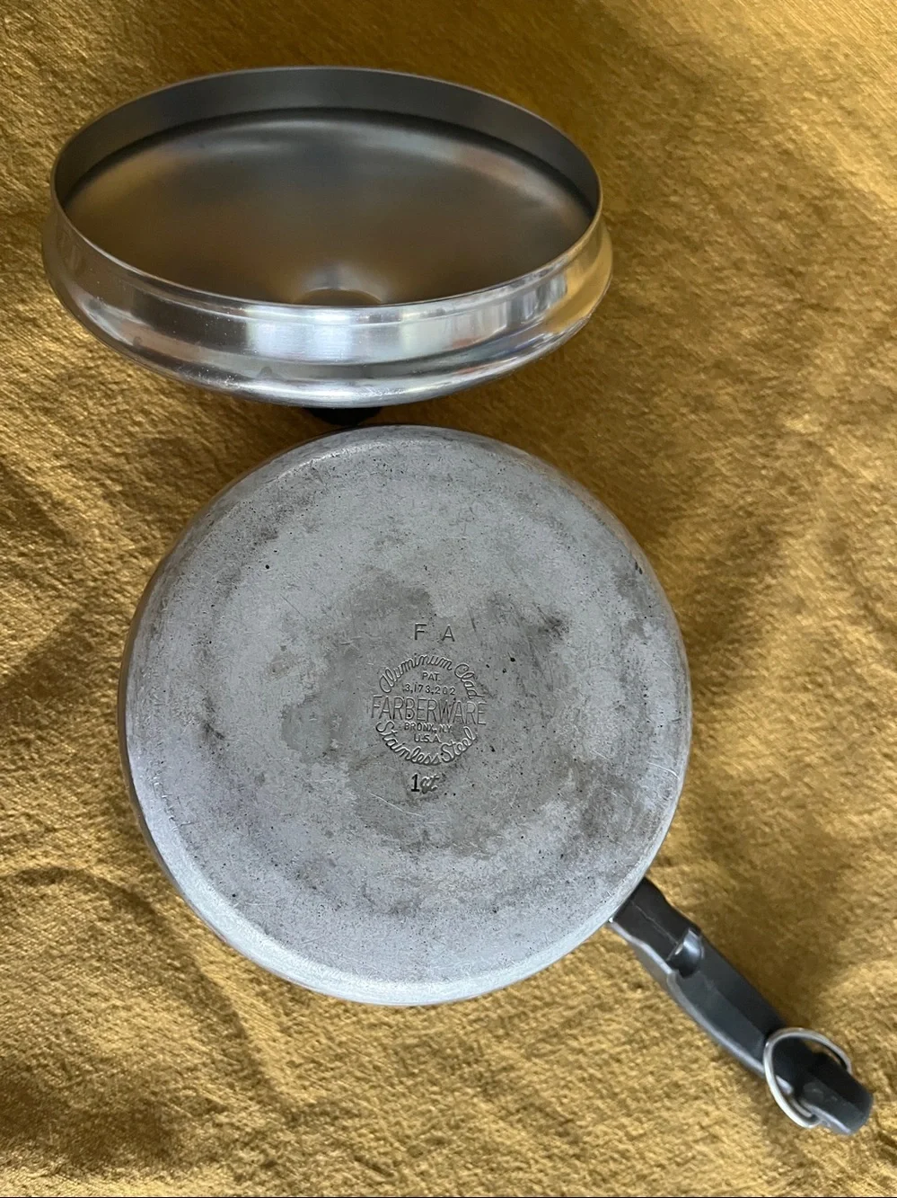 1 qt. Farberware aluminum clad Stainless Steel Saucepan with Black Handle